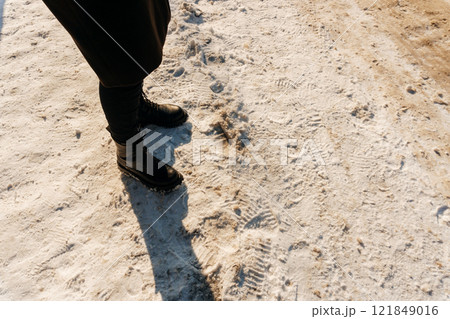 a sidewalk covered with snow in Kazakhstan. pedestrian sidewalk full of snow in Shymkent 121849016