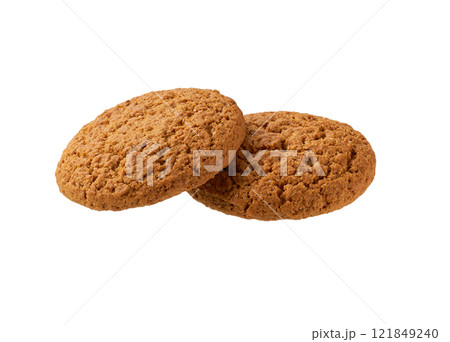 Two oatmeal cookies  isolated. Round oatmeal cookies  isolated on white background. 121849240