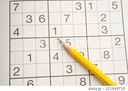 Sudoku puzzle, game to play for keep you brain younger for developing Alzheimer disease in senior patient. 121849710