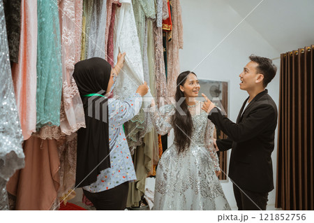 Offering expert fashion consultation services for stunning bridal gowns in our boutique 121852756