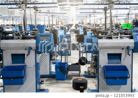 Textile Manufacturing Machines in Modern Factory Textile Manufacturing Machines in Modern Factory 121853993