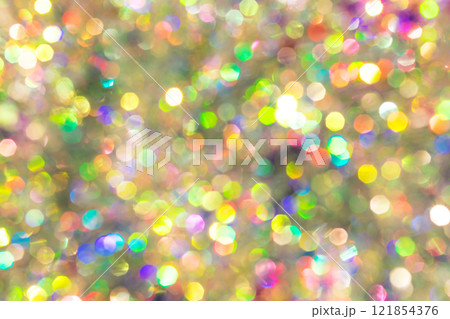 Abstract colorful light bokeh background with shimmering rainbow highlights and soft focus Abstract colorful light bokeh background with shimmering rainbow highlights and soft focus 121854376
