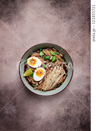 soba, buckwheat noodles, with enoki mushrooms, shimeji and boiled egg, top view, homemade, no people, 121855721