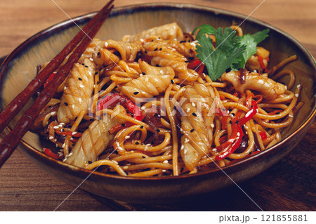udon noodles, with squid and vegetables, on a wooden table, homemade, no people, udon noodles, with squid and vegetables, on a wooden table, homemade, no people, 121855881