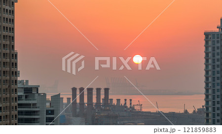 Aerial view of Dubai Marina from a vantage point at sunset timelapse. 121859883