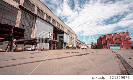 The old factory bricks building with windows and gates timelapse hyperlapse The old factory bricks building with windows and gates timelapse hyperlapse 121859978