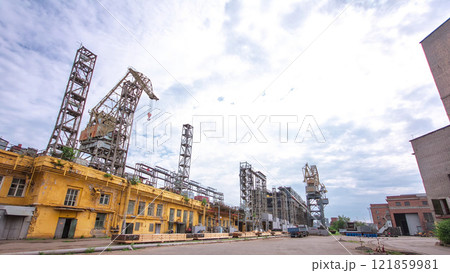 The construction of a large ship on a shipyard with cranes timelapse. The construction of a large ship on a shipyard with cranes timelapse. 121859981
