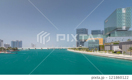 Modern buildings in Abu Dhabi skyline timelapse hyperlapse with waterfront. 121860122