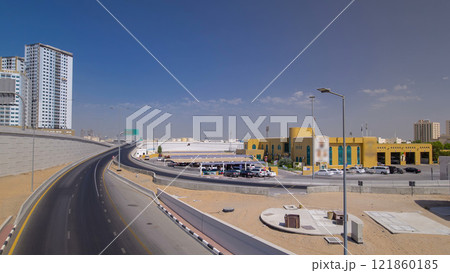Road traffic in Ajman, view from bridge at day timelapse hyperlapse Road traffic in Ajman, view from bridge at day timelapse hyperlapse 121860185