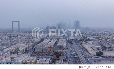 Dubai cityscape during sand storm day to night timelapse 121860348