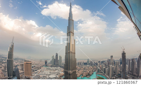 Panoramic skyline view of Dubai downtown with mall, fountains and Burj Khalifa aerial day to night timelapse 121860367