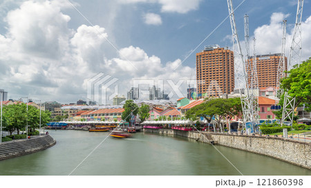 Tourist boats docking at Clarke Quay habour timelapse hyperlapse. 121860398