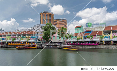 Tourist boats docking at Clarke Quay harbor timelapse hyperlapse. Tourist boats docking at Clarke Quay harbor timelapse hyperlapse. 121860399