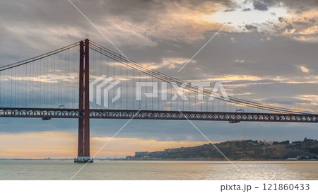 Lisbon city sunrise with April 25 bridge timelapse 121860433