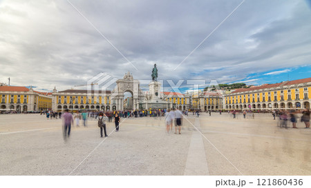 Triumphal arch at Rua Augusta and bronze statue of King Jose I at Commerce square timelapse hyperlapse in Lisbon, Portugal. 121860436