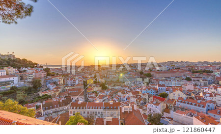 Lisbon at sunset aerial panorama of city centre with red roofs at Autumn evening timelapse, Portugal Lisbon at sunset aerial panorama of city centre with red roofs at Autumn evening timelapse, Portugal 121860447