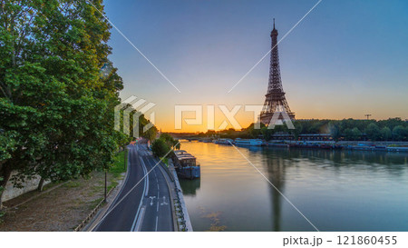 Eiffel Tower and the Seine river at Sunrise timelapse, Paris, France 121860455