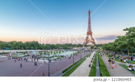 Sunset view of Eiffel Tower timelapse with fountain in Jardins du Trocadero in Paris, France. Sunset view of Eiffel Tower timelapse with fountain in Jardins du Trocadero in Paris, France. 121860465