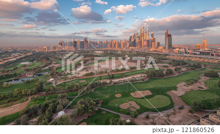 Dubai Marina skyscrapers and golf course morning timelapse, Dubai, United Arab Emirates 121860526