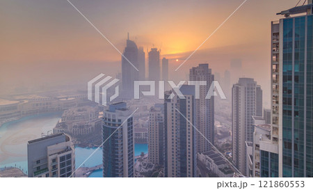 Foggy morning sunrise in downtown of Dubai timelapse. 121860553