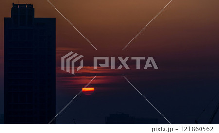 Foggy morning sunrise in downtown of Dubai timelapse. 121860562
