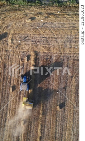 Harvest time in agriculture with equipment Harvest time in agriculture with equipment 121861023