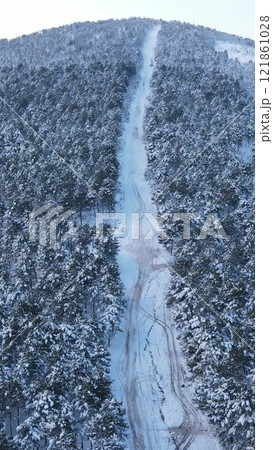 Snow winter forest road aerial drone Snow winter forest road aerial drone 121861028