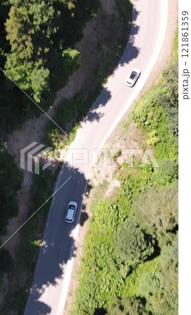 Aerial View Driving Car Forest 121861359