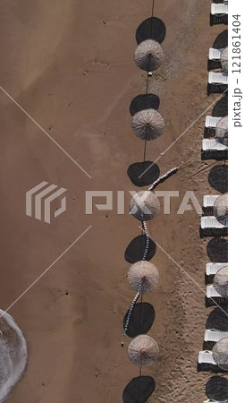 Empty beach umbrellas due to coronavirus Empty beach umbrellas due to coronavirus 121861404