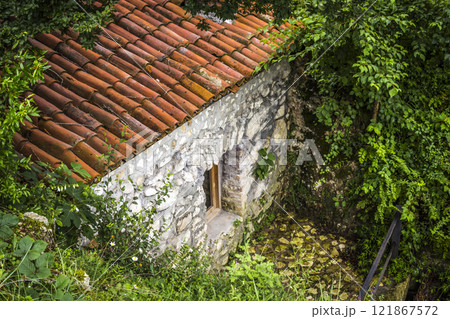A small stone house 121867572