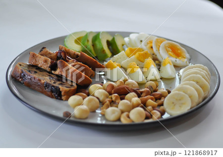 walnut cranberry sourdough bread or cranberry sourdough with boiled egg , avocado , banana and nuts walnut cranberry sourdough bread or cranberry sourdough with boiled egg , avocado , banana and nuts 121868917