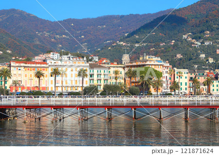 View from sea of traditional buildings and old architecture of Rapallo, Italy. Tourism and recreation. Historical centre. View from sea of traditional buildings and old architecture of Rapallo, Italy. Tourism and recreation. Historical centre. 121871624