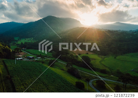 Drone view of a rural area with araucaria and sunshine in Urubici, Santa Catarina, Brazil Drone view of a rural area with araucaria and sunshine in Urubici, Santa Catarina, Brazil 121872239