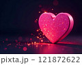 A pink voluminous textured heart stands on a dark surface on a dark background, golden sparkles and pink bokeh with space for text are visible. Concept for St. Valentine, Love. High quality photo 121872622