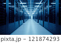 High-tech data center with rows of servers illuminated by blue lights 121874293
