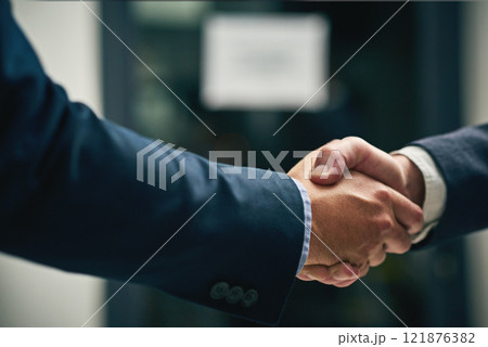 Handshake, deal and successful merger closeup after agreement. Professional people building a career and relationship with trust. Formal business gesture after meeting or welcome greeting. Handshake, deal and successful merger closeup after agreement. Professional people building a career and relationship with trust. Formal business gesture after meeting or welcome greeting. 121876382