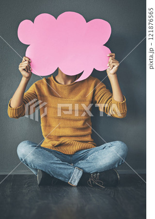 Woman holding thought bubble, chat or speech board for voicing opinions, chatting on social media or sharing ideas. Creative thinking of marketing strategy, planning or innovating vision for business Woman holding thought bubble, chat or speech board for voicing opinions, chatting on social media or sharing ideas. Creative thinking of marketing strategy, planning or innovating vision for business 121876565