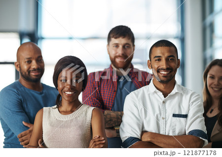 Motivated, ambitious and proud creative team of men and women standing with arms folded to show unity, power and teamwork. Portrait of happy diverse group of business people feeling united together Motivated, ambitious and proud creative team of men and women standing with arms folded to show unity, power and teamwork. Portrait of happy diverse group of business people feeling united together 121877178