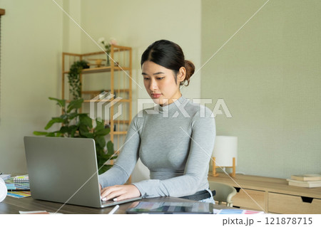 Young female architect envisions project with technology. Young female architect envisions project with technology. 121878715
