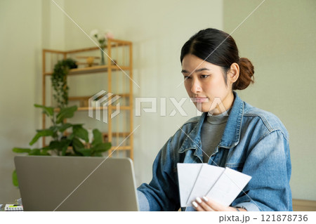 Young female architect envisions project with technology. 121878736
