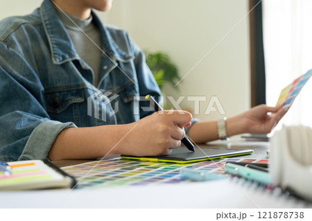 Young female architect envisions project with technology. Young female architect envisions project with technology. 121878738