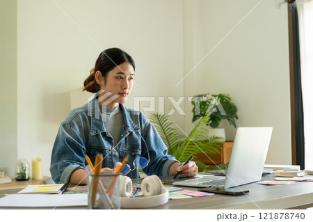 Young female architect envisions project with technology. 121878740