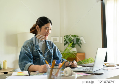 Young female architect envisions project with technology. 121878741