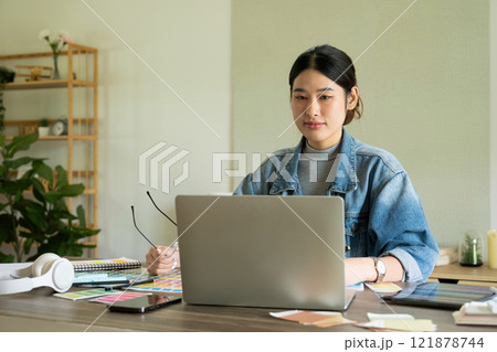 Young female architect envisions project with technology. 121878744