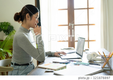 Young female architect envisions project with technology. Young female architect envisions project with technology. 121878897
