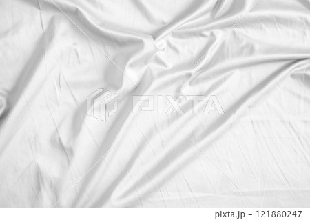 Abstract white wrinkled bedding sheet fabric texture background 121880247