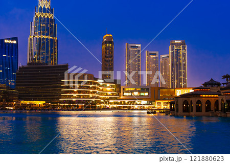 Panoramic skyline and modern commercial buildings with empty lagoon. cityscape at night. High quality photo Panoramic skyline and modern commercial buildings with empty lagoon. cityscape at night. High quality photo 121880623