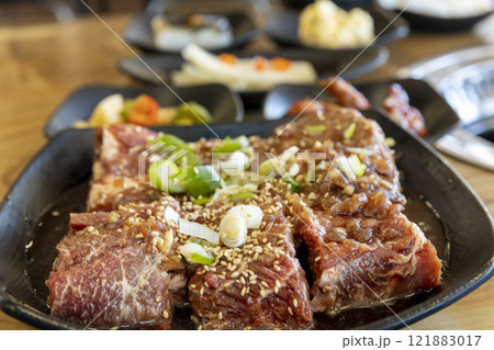 Korean BBQ. Seasoned beef ribs Korean BBQ. Seasoned beef ribs 121883017
