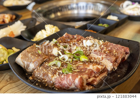 Korean BBQ. Seasoned beef ribs Korean BBQ. Seasoned beef ribs 121883044
