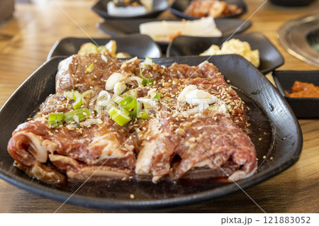 Korean BBQ. Seasoned beef ribs Korean BBQ. Seasoned beef ribs 121883052